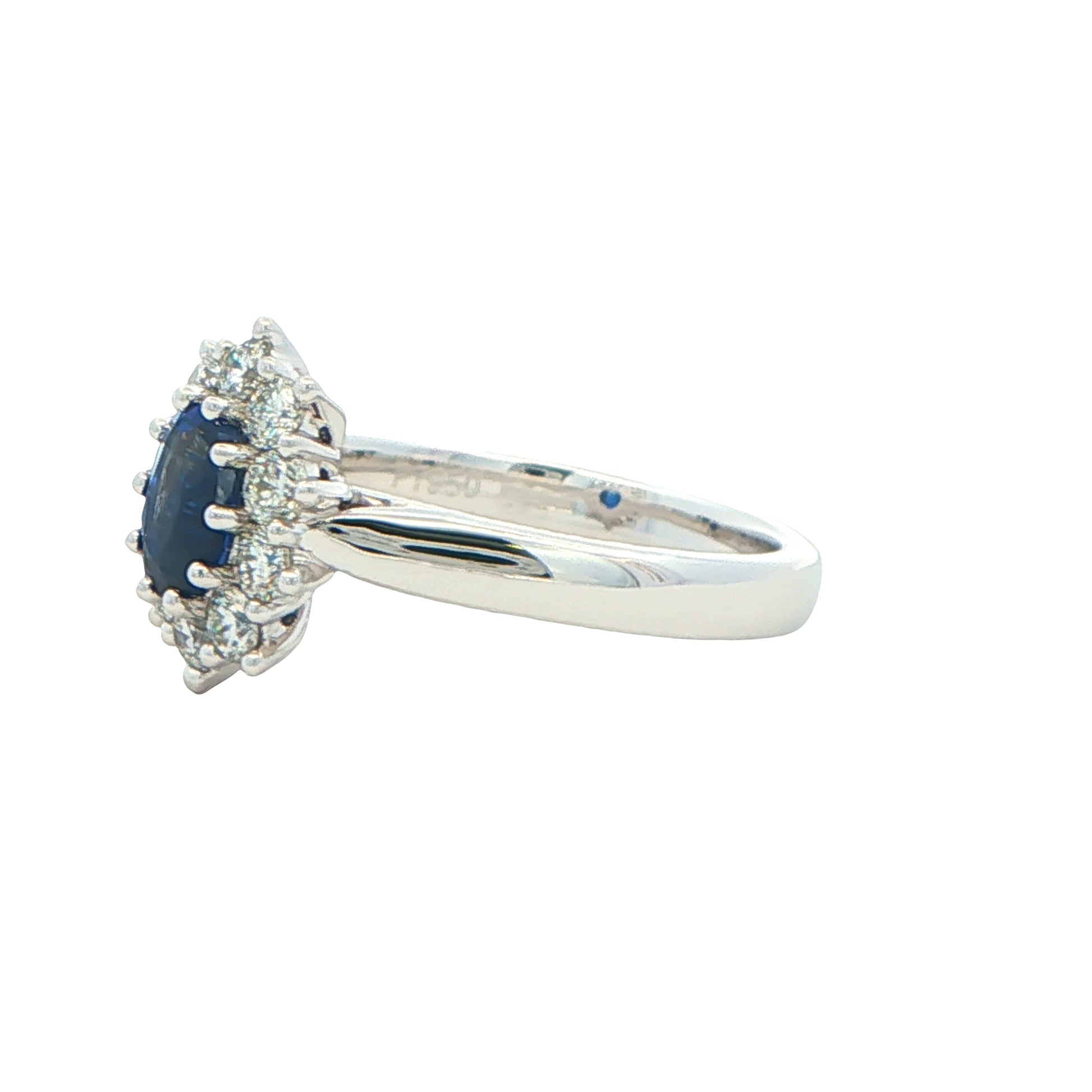 Oval Sapphire and round brilliant cut diamond cluster ring Gardiner Brothers
