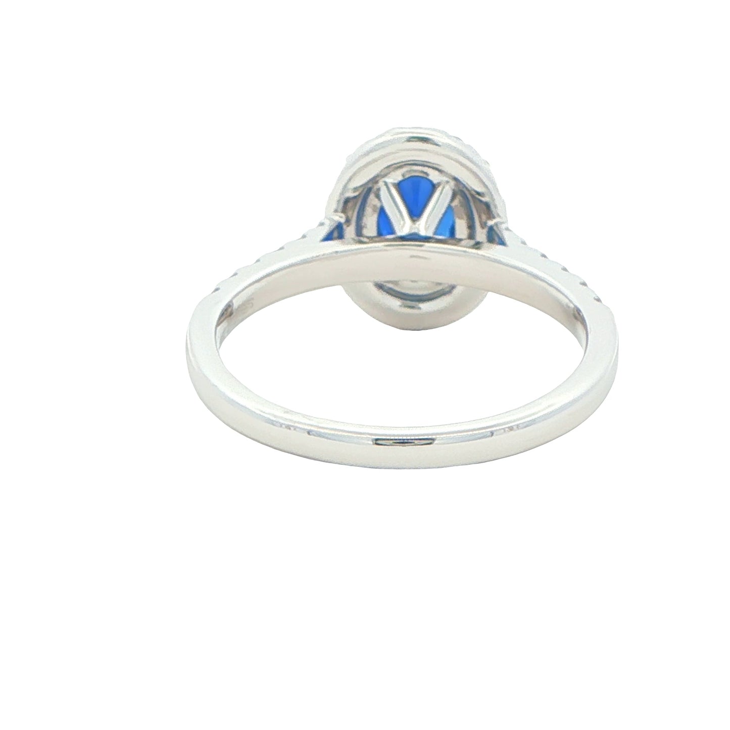 Oval Shaped Sapphire and Round Brilliant Cut Diamond Halo Ring Gardiner Brothers