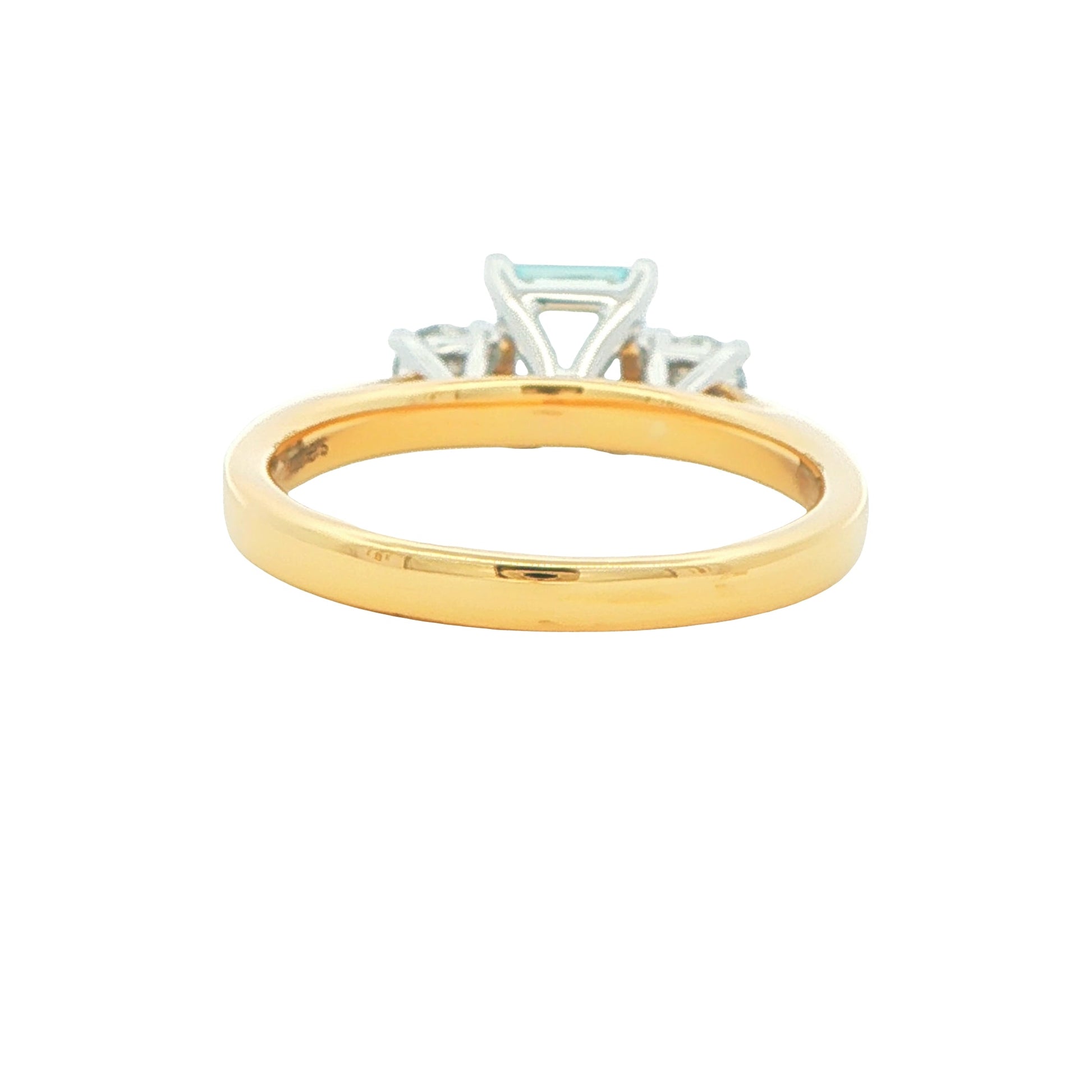 Octagonal Aquamarine and round brilliant cut diamond 3 stone ring Gardiner Brothers