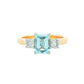 Octagonal Aquamarine and round brilliant cut diamond 3 stone ring Gardiner Brothers