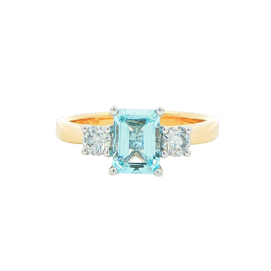 Octagonal Aquamarine and round brilliant cut diamond 3 stone ring Gardiner Brothers