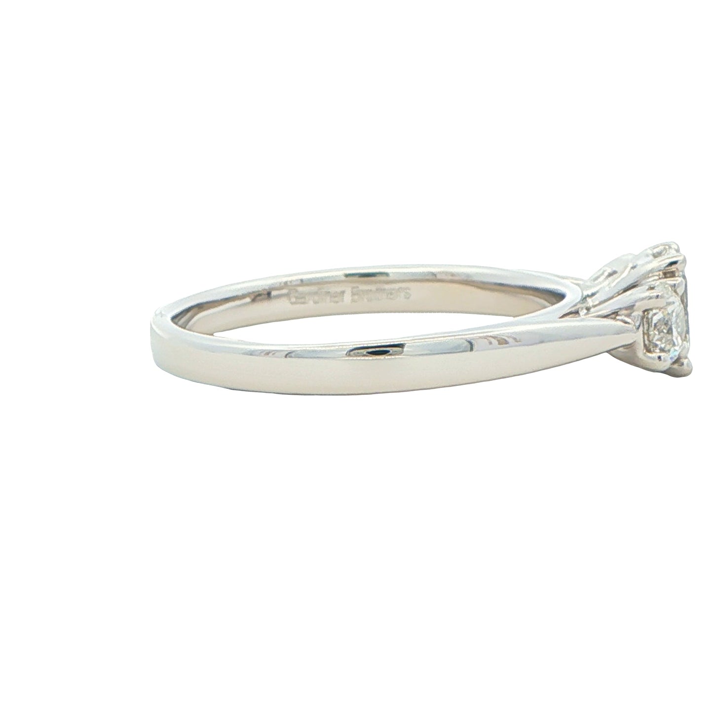 Platinum Emerald and round brilliant cut diamond 3 stone ring - 1.00cts Gardiner Brothers