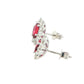 Oval shaped ruby and round brilliant cut diamond cluster style earrings Gardiner Brothers