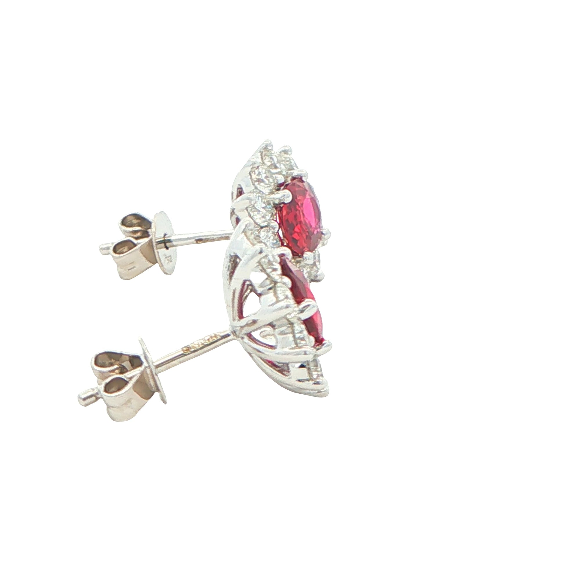 Oval shaped ruby and round brilliant cut diamond cluster style earrings Gardiner Brothers