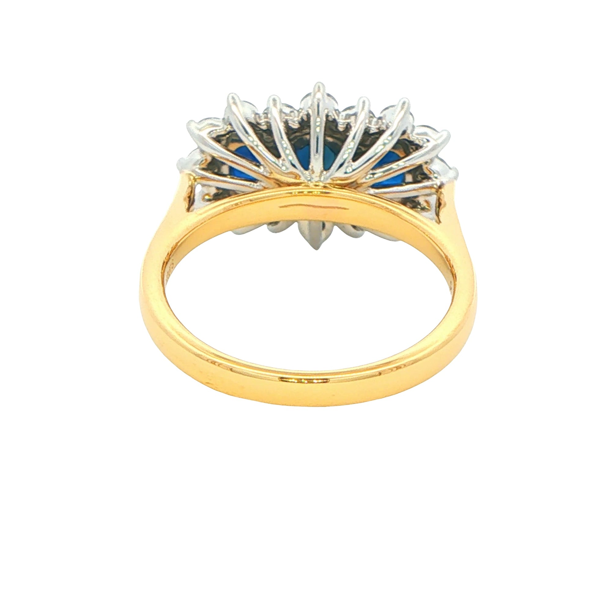 Oval Shaped Sapphire and Diamond Cluster Style Ring Gardiner Brothers