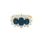 Oval Shaped Sapphire and Diamond Cluster Style Ring Gardiner Brothers