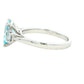 Octagonal Aquamarine and round brilliant cut diamond 3 stone ring Gardiner Brothers