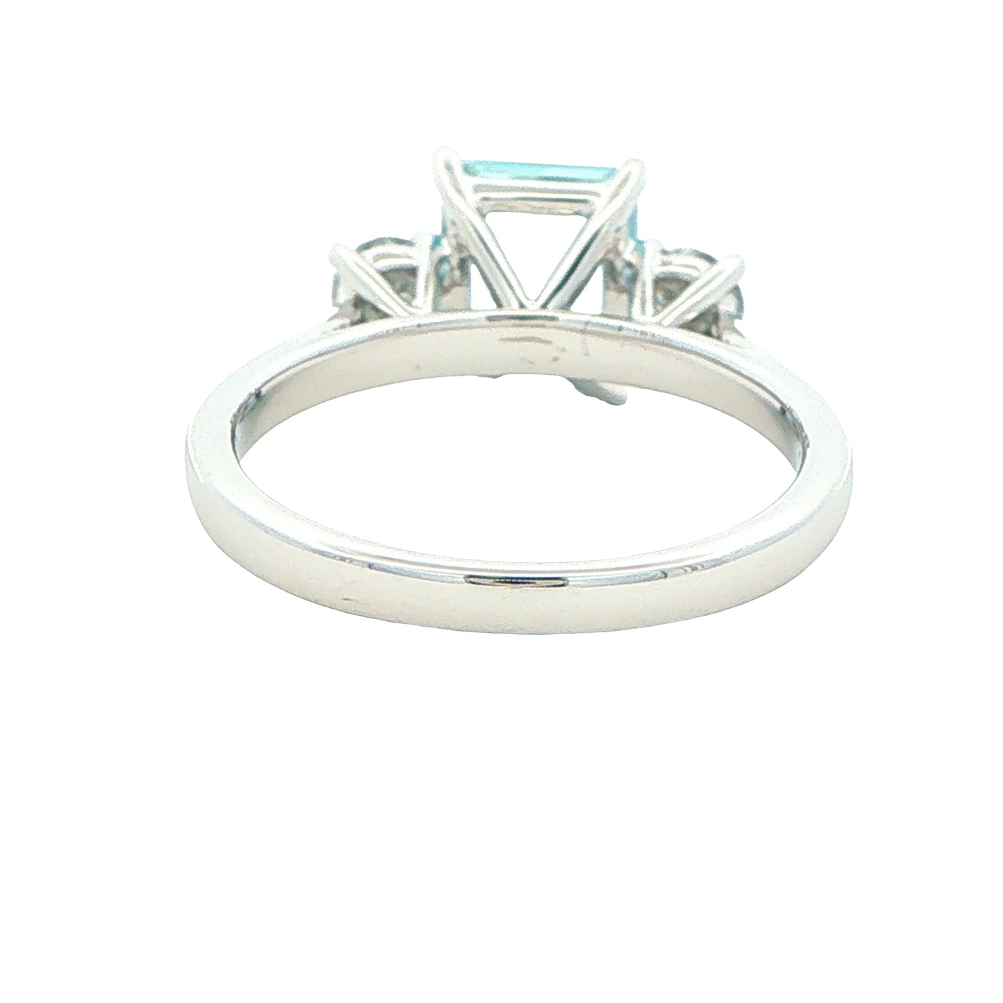 Octagonal Aquamarine and round brilliant cut diamond 3 stone ring Gardiner Brothers