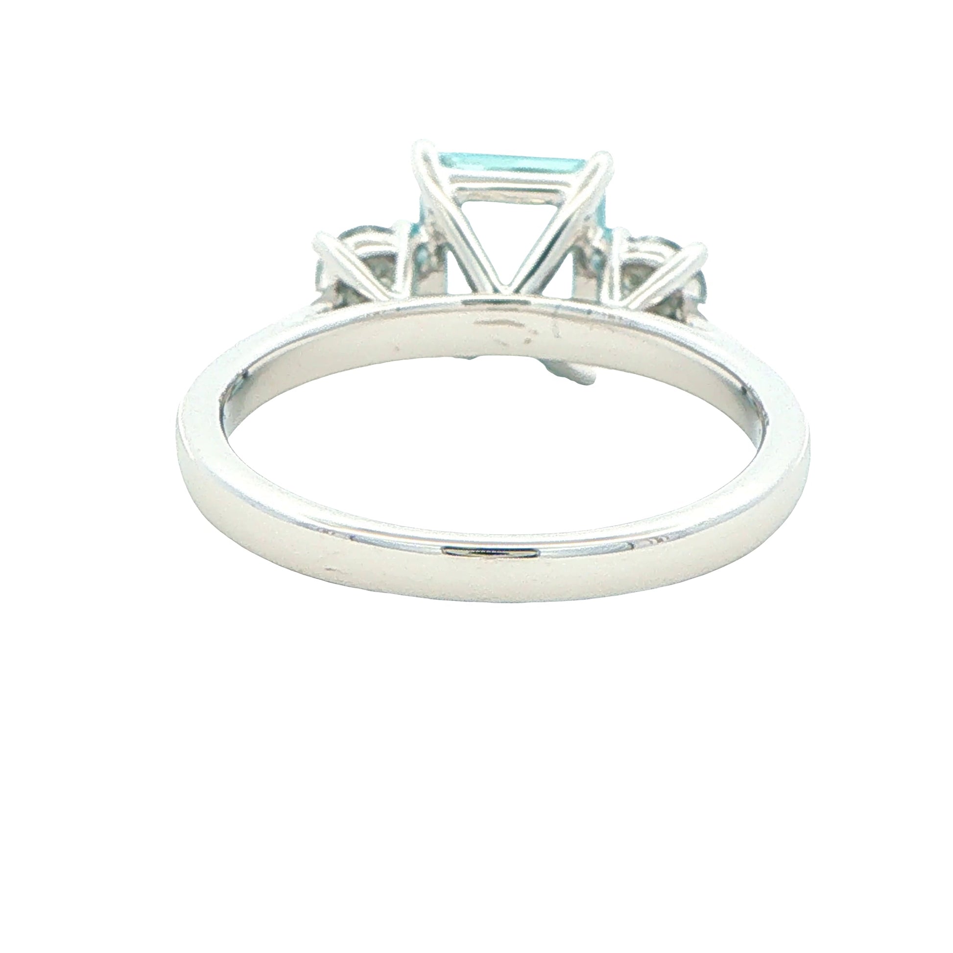 Octagonal Aquamarine and round brilliant cut diamond 3 stone ring Gardiner Brothers