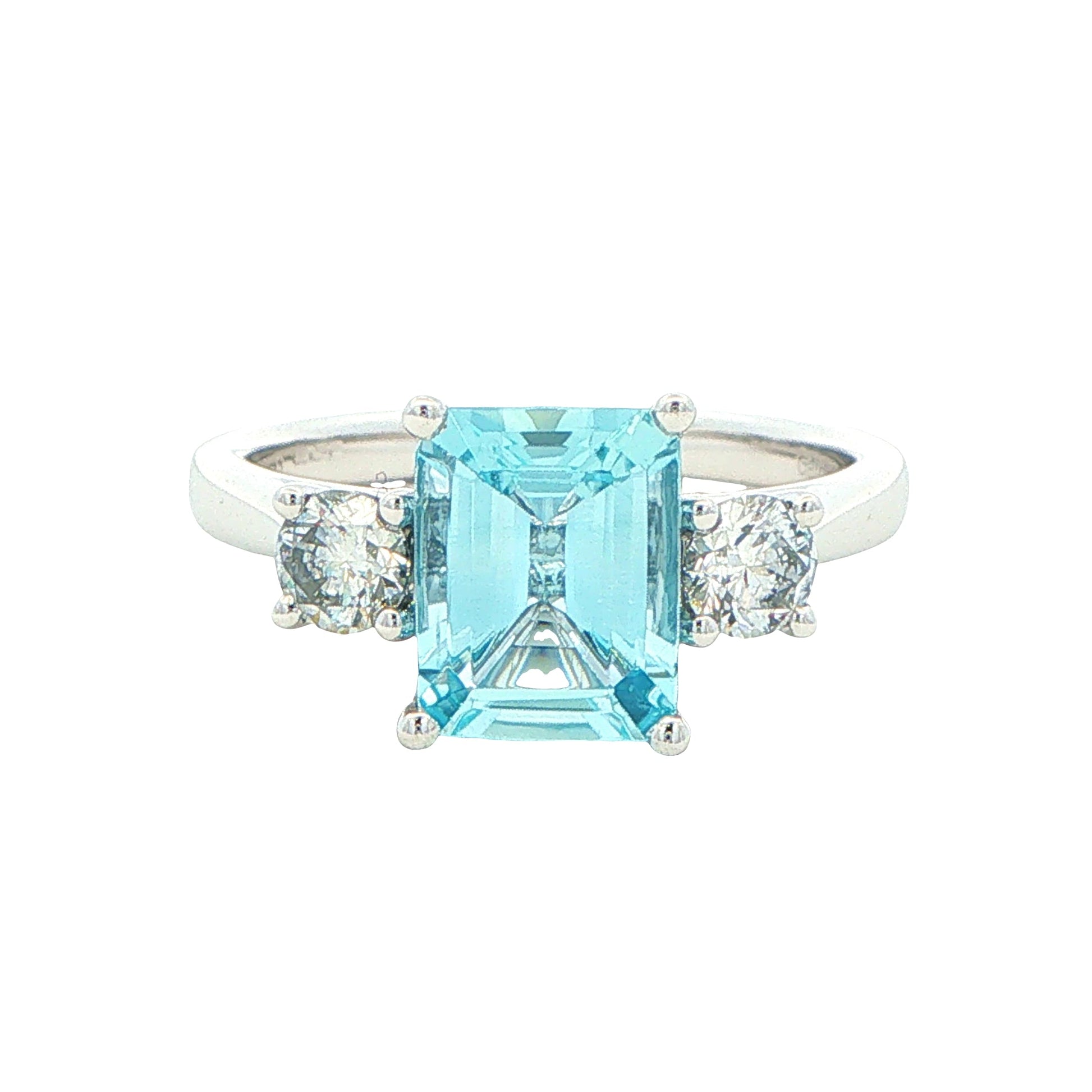 Octagonal Aquamarine and round brilliant cut diamond 3 stone ring Gardiner Brothers