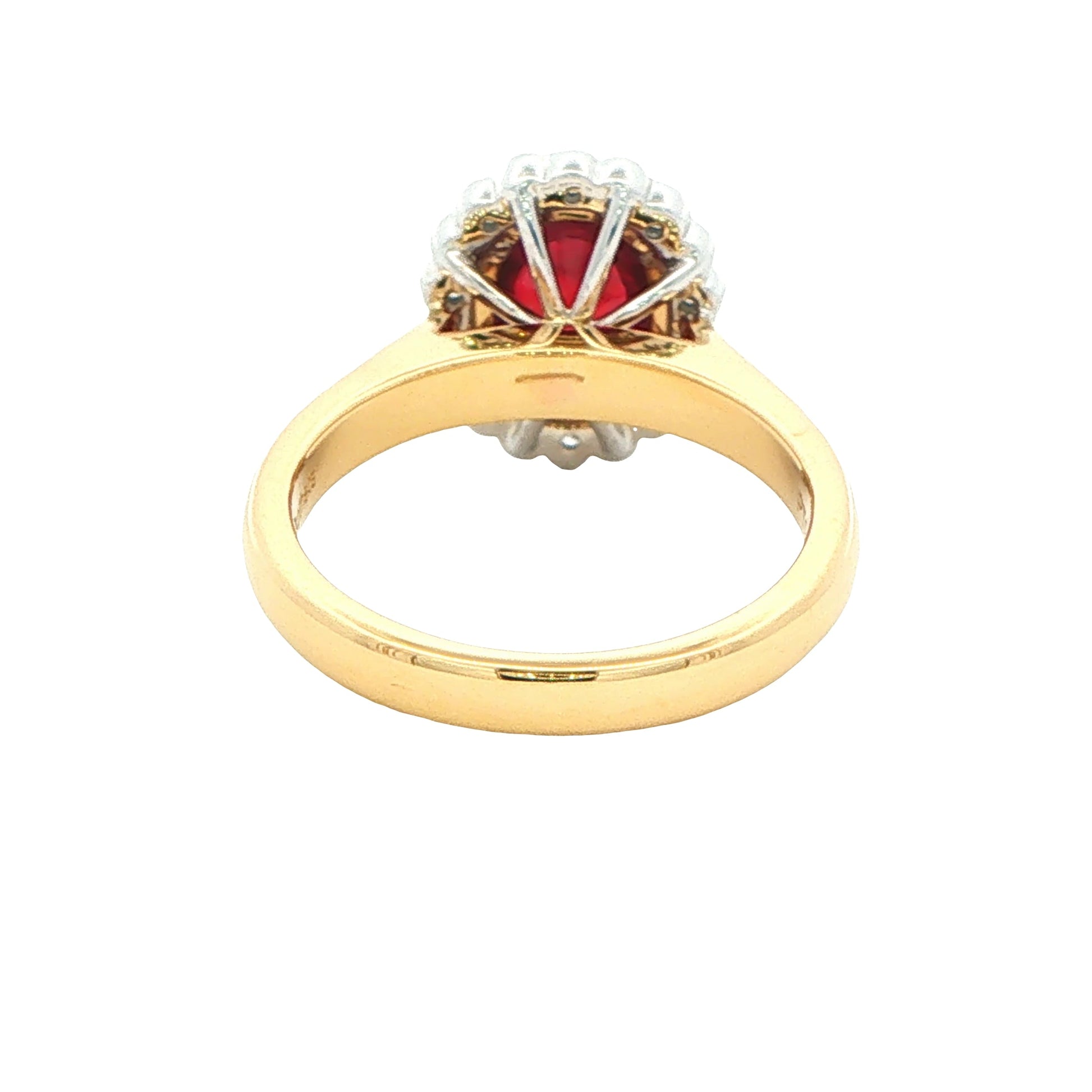 Oval ruby and round brilliant cut diamond vintage style cluster ring Gardiner Brothers