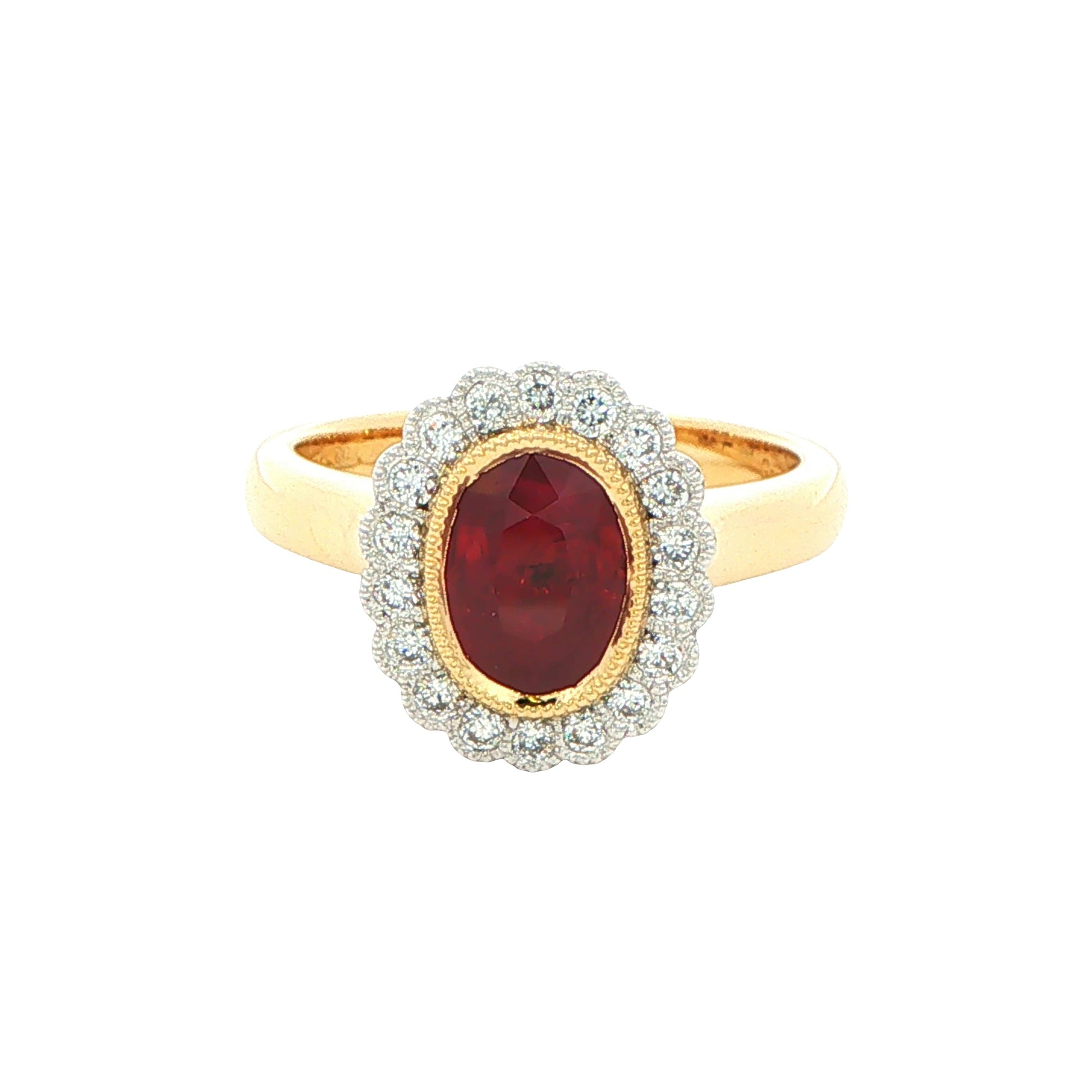 Oval ruby and round brilliant cut diamond vintage style cluster ring Gardiner Brothers