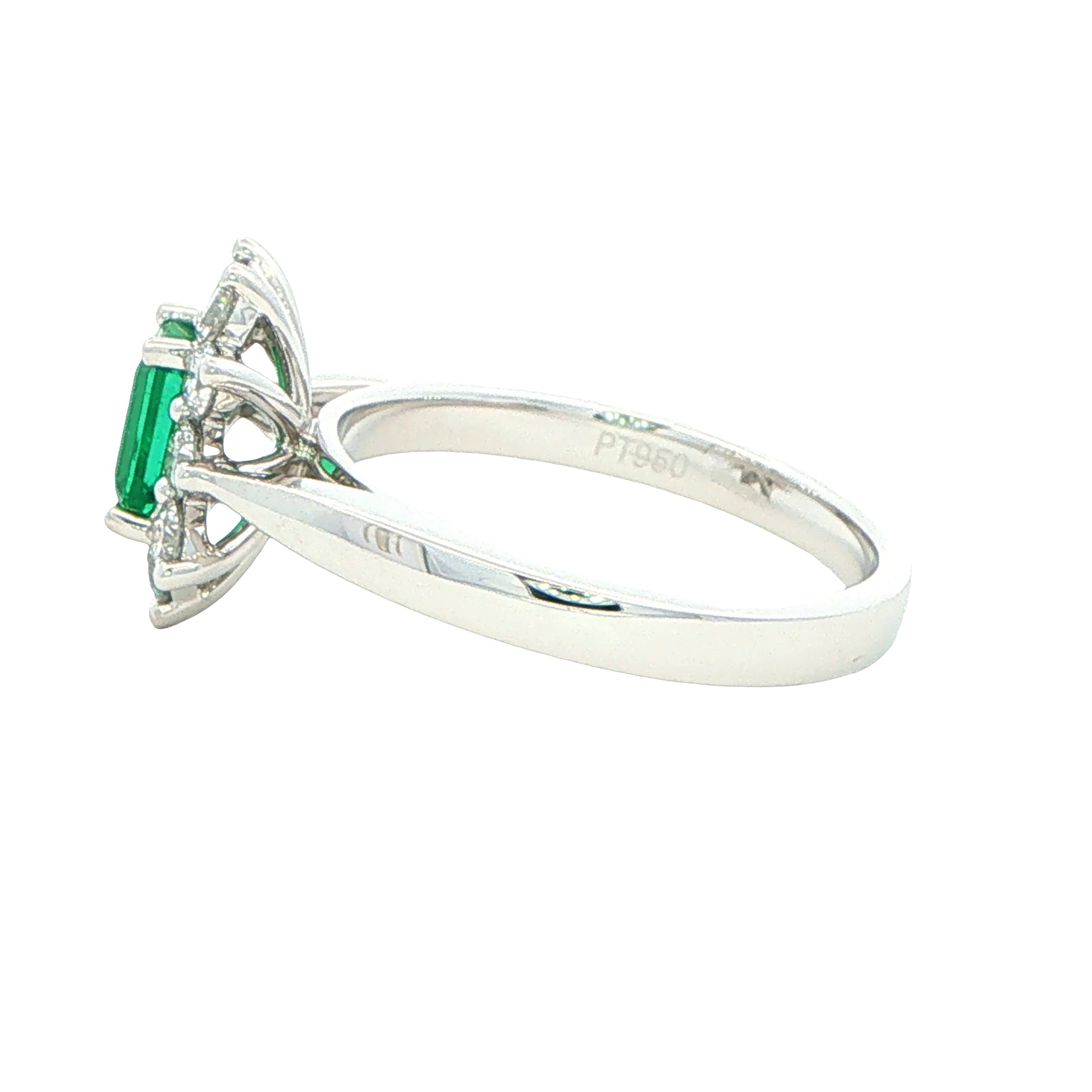 Octagonal shaped emerald and round brilliant cut diamond cluster style ring Gardiner Brothers