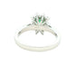 Octagonal shaped emerald and round brilliant cut diamond cluster style ring Gardiner Brothers