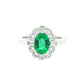 Oval emerald and diamond fancy cluster style ring