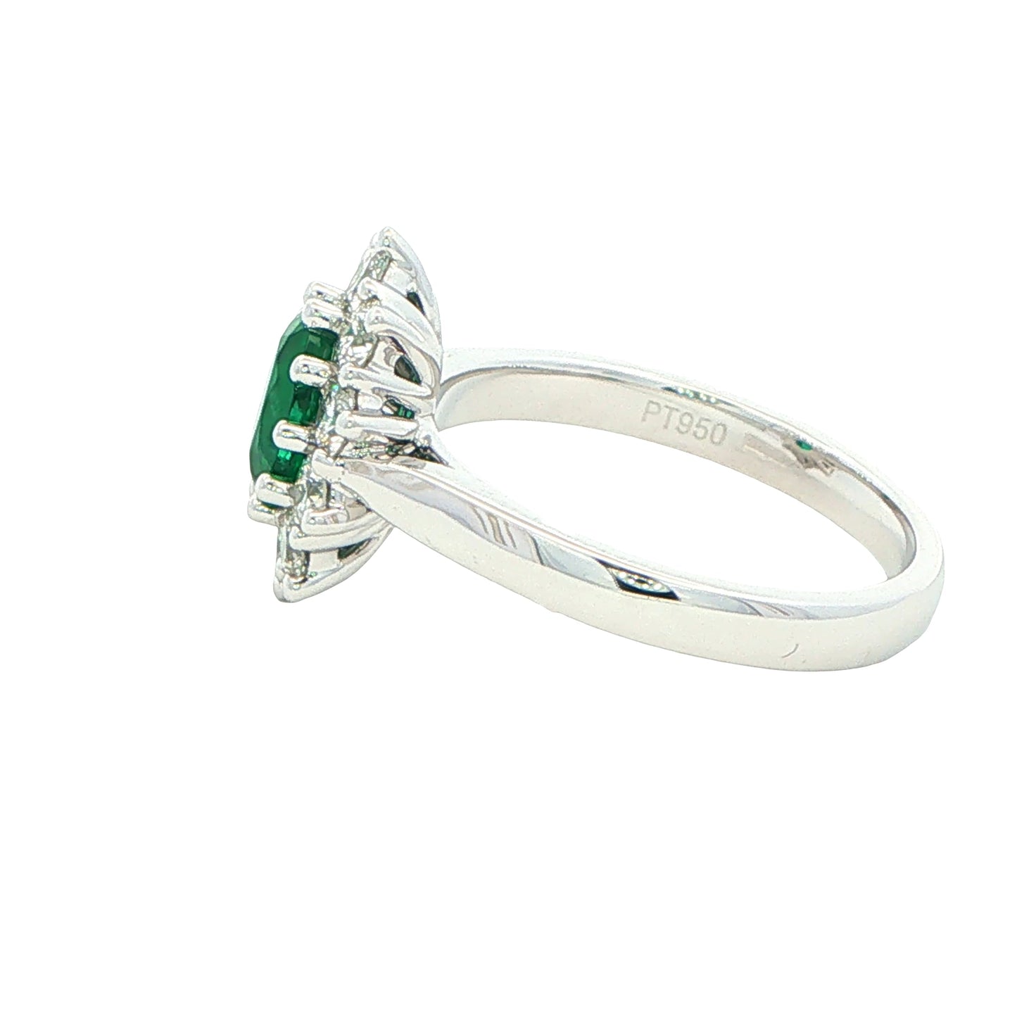 Emerald and round brilliant cut diamond cluster style ring
