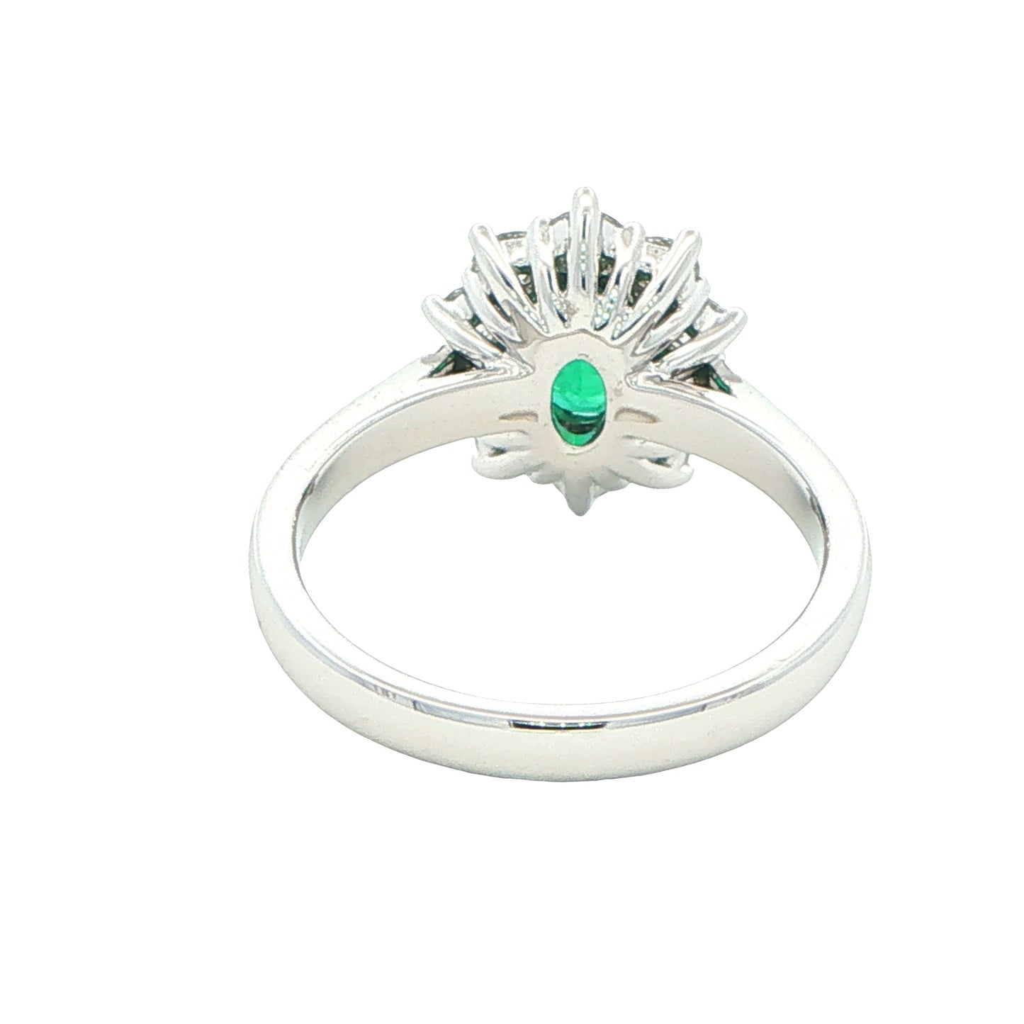 Emerald and round brilliant cut diamond cluster style ring Gardiner Brothers
