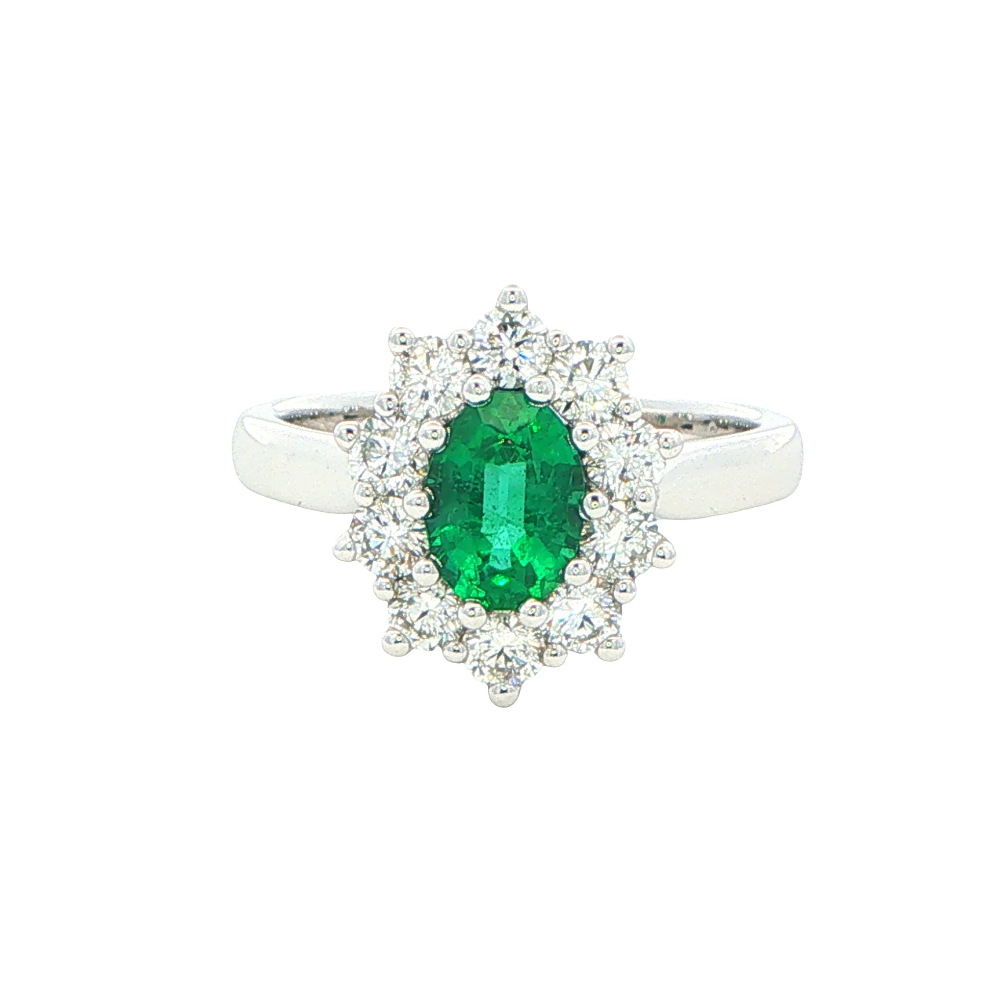 Emerald and round brilliant cut diamond cluster style ring Gardiner Brothers