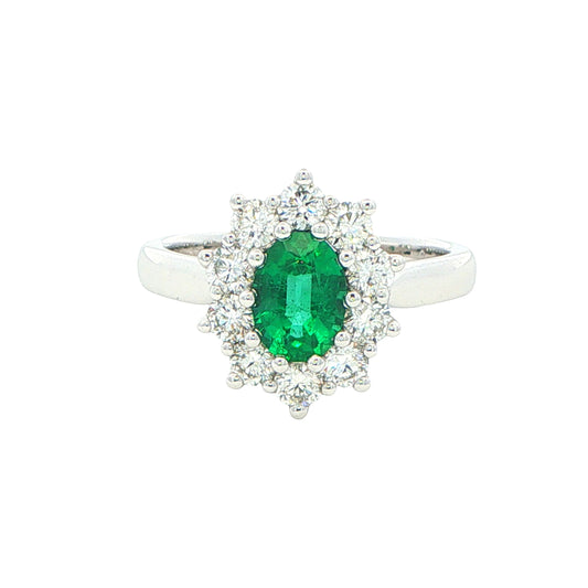 Emerald and round brilliant cut diamond cluster style ring Gardiner Brothers