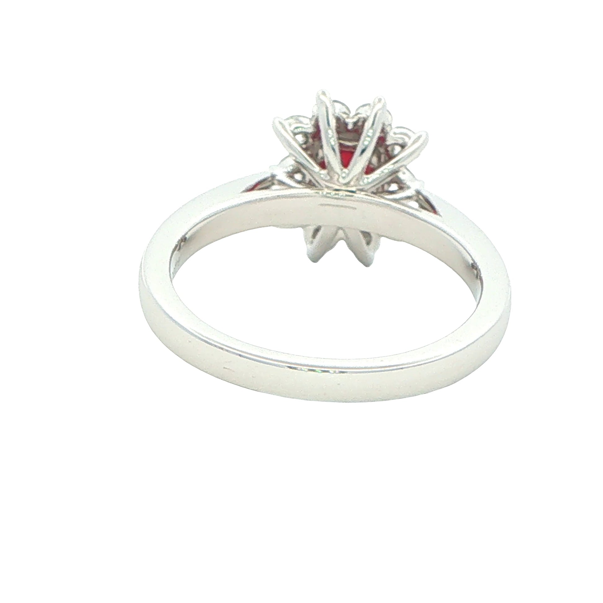 Octagonal shaped ruby and round brilliant cut diamond cluster ring Gardiner Brothers