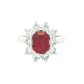 Octagonal shaped ruby and round brilliant cut diamond cluster ring