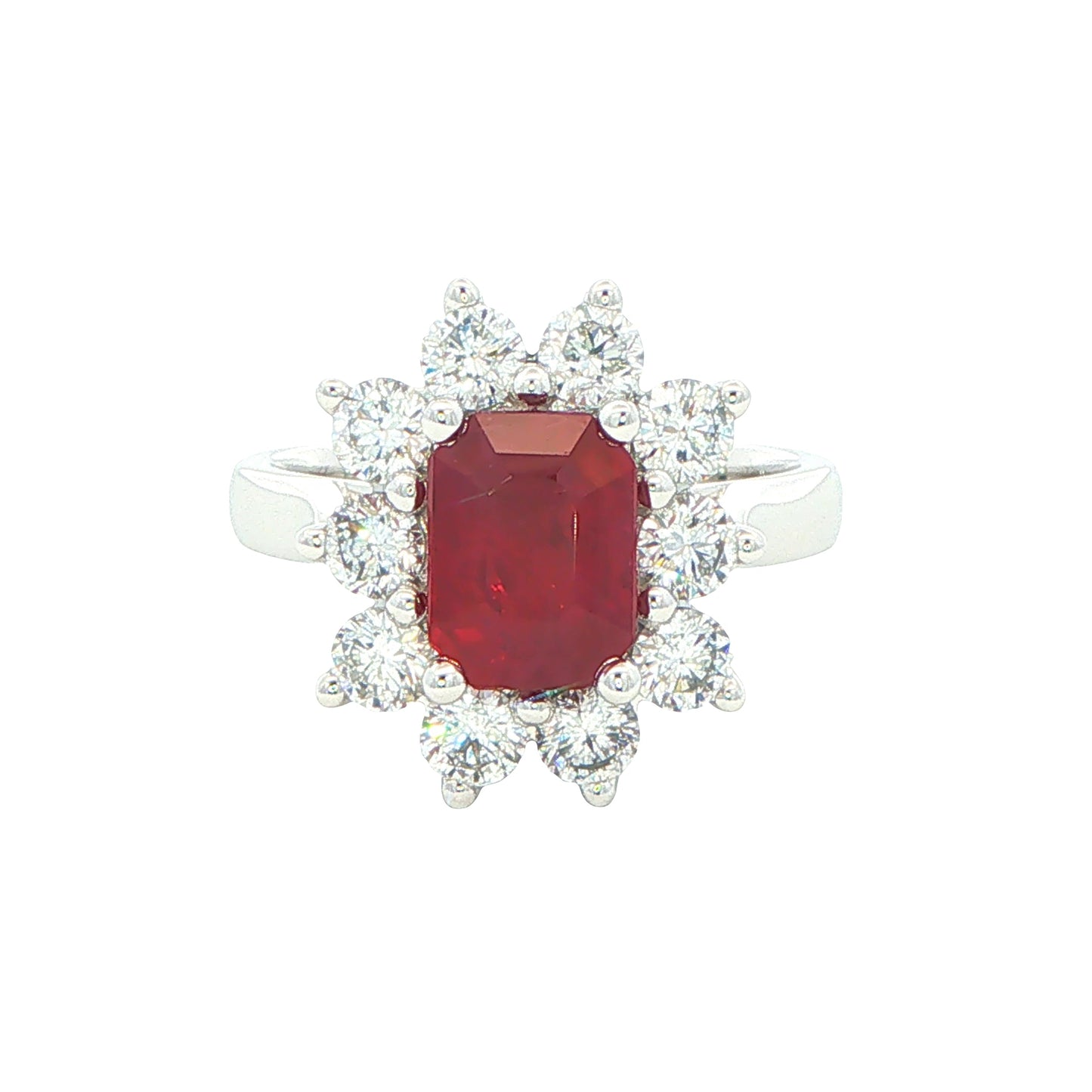 Octagonal shaped ruby and round brilliant cut diamond cluster ring