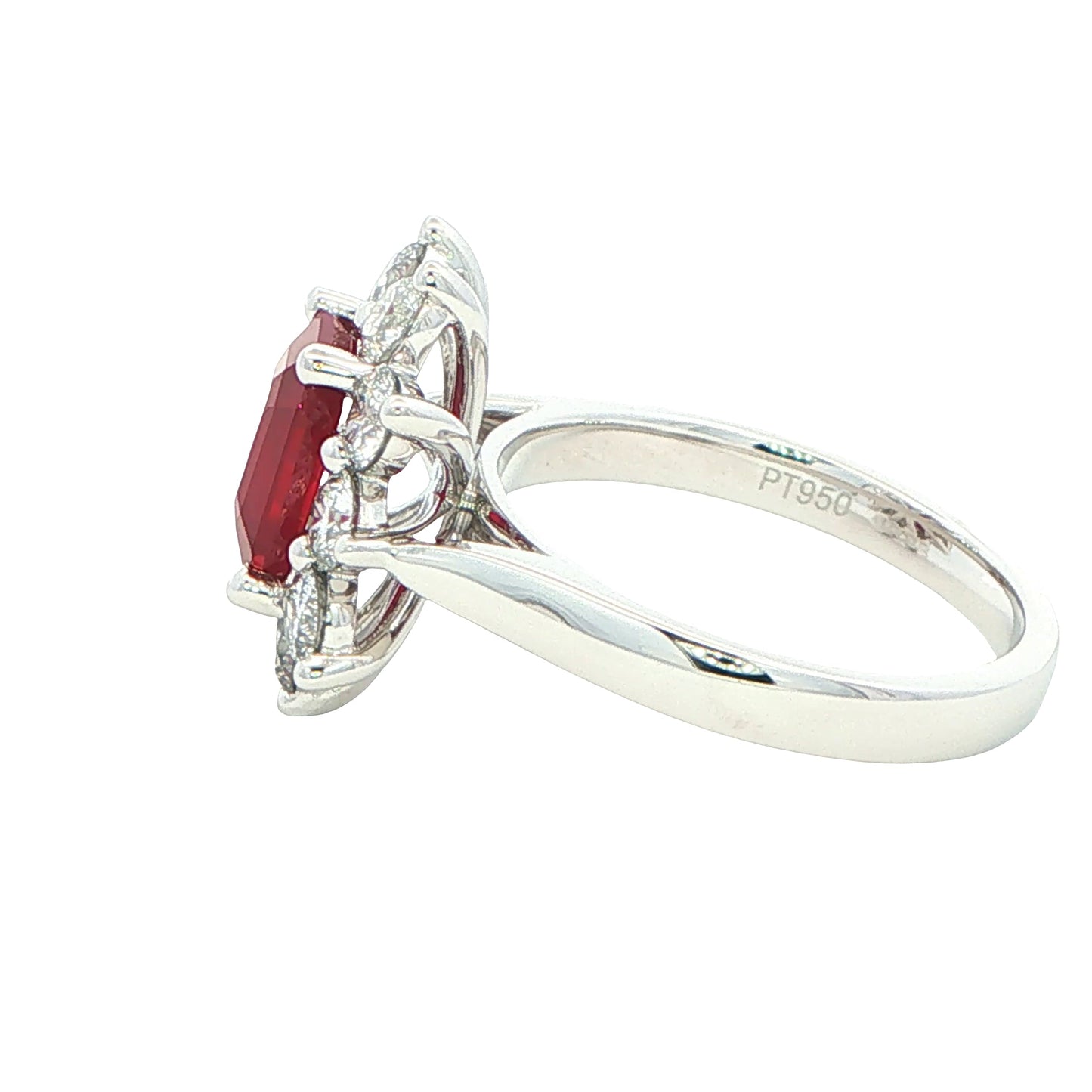 Octagonal shaped ruby and round brilliant cut diamond cluster ring