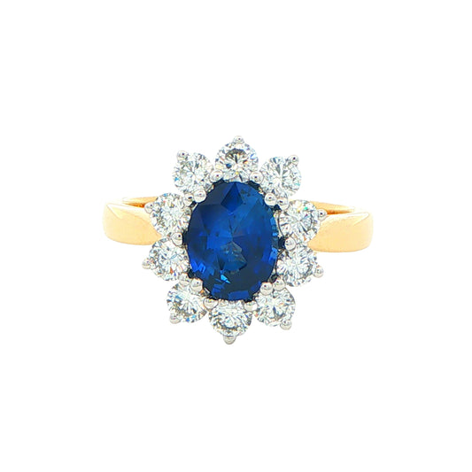 SAPPHIRE AND ROUND BRILLIANT CUT DIAMOND CLUSTER STYLE RING Gardiner Brothers