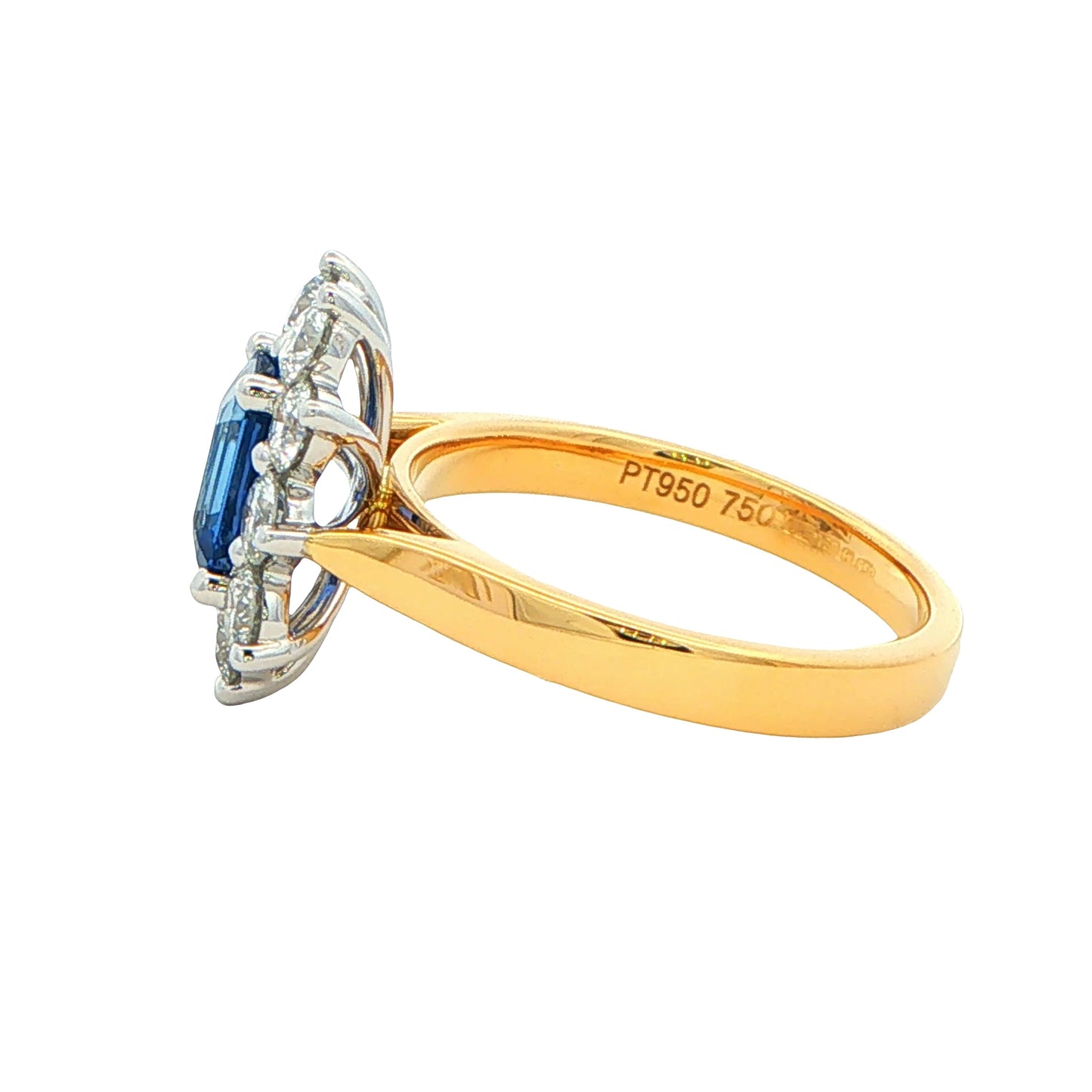 Octagonal Sapphire and round brilliant cut diamond cluster ring
