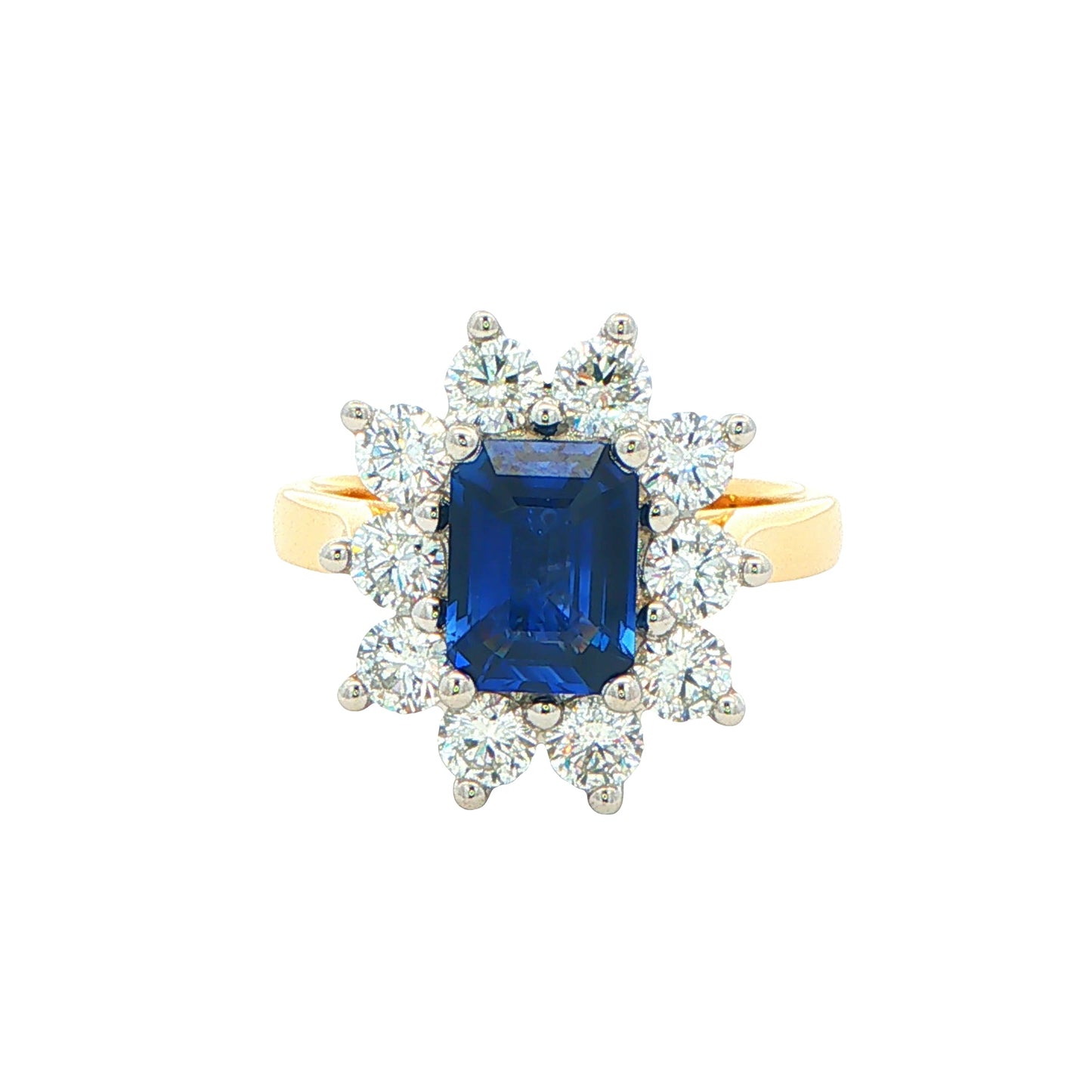 Octagonal Sapphire and round Brilliant Cut Diamond Cluster Style Ring