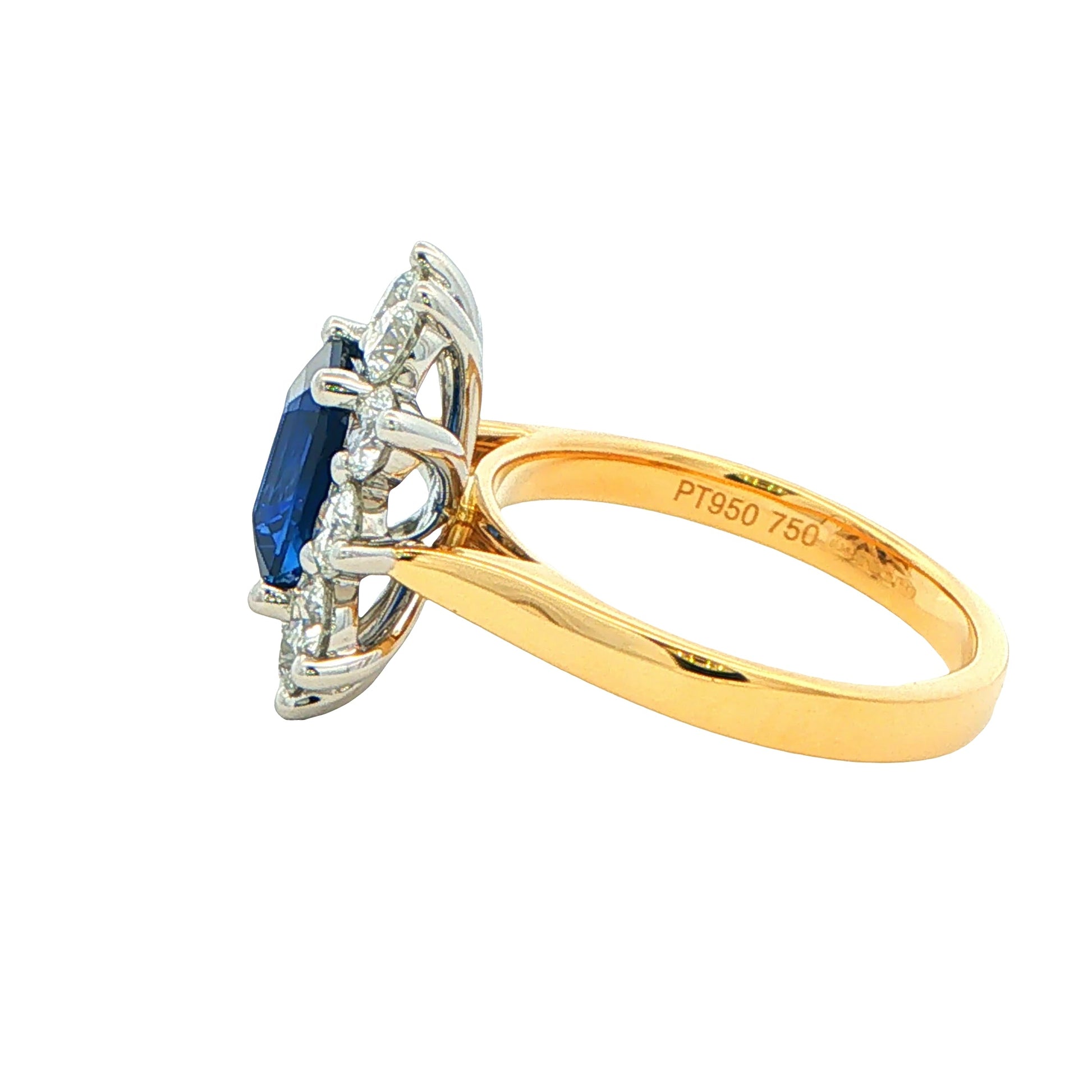 Octagonal Sapphire and round Brilliant Cut Diamond Cluster Style Ring Gardiner Brothers