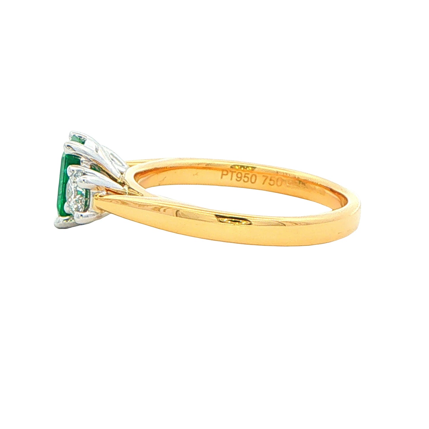 Octagonal Emerald and round brilliant cut diamond 3 stone ring