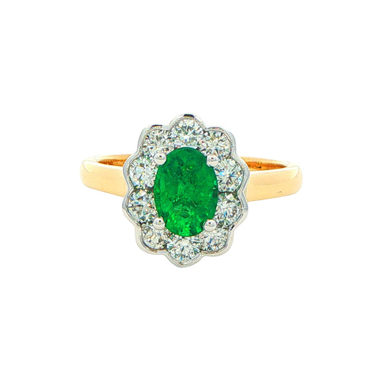 Oval Emerald and Round Brilliant Cut Diamond Cluster Ring Gardiner Brothers