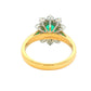 Oval Emerald AND ROUND BRILLIANT CUT DIAMOND CLUSTER STYLE RING