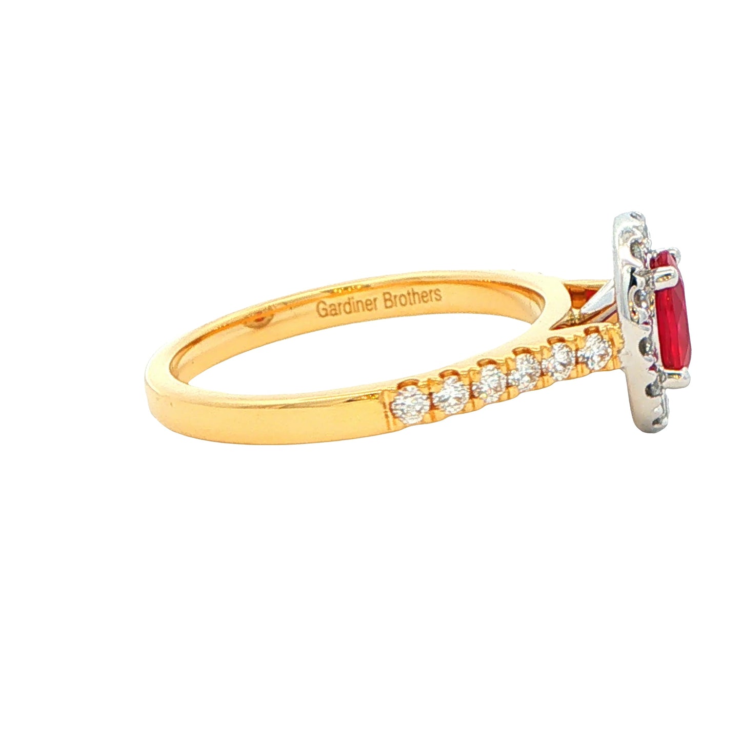 Oval Shaped Ruby and Round Brilliant Cut Diamond Halo Ring Gardiner Brothers