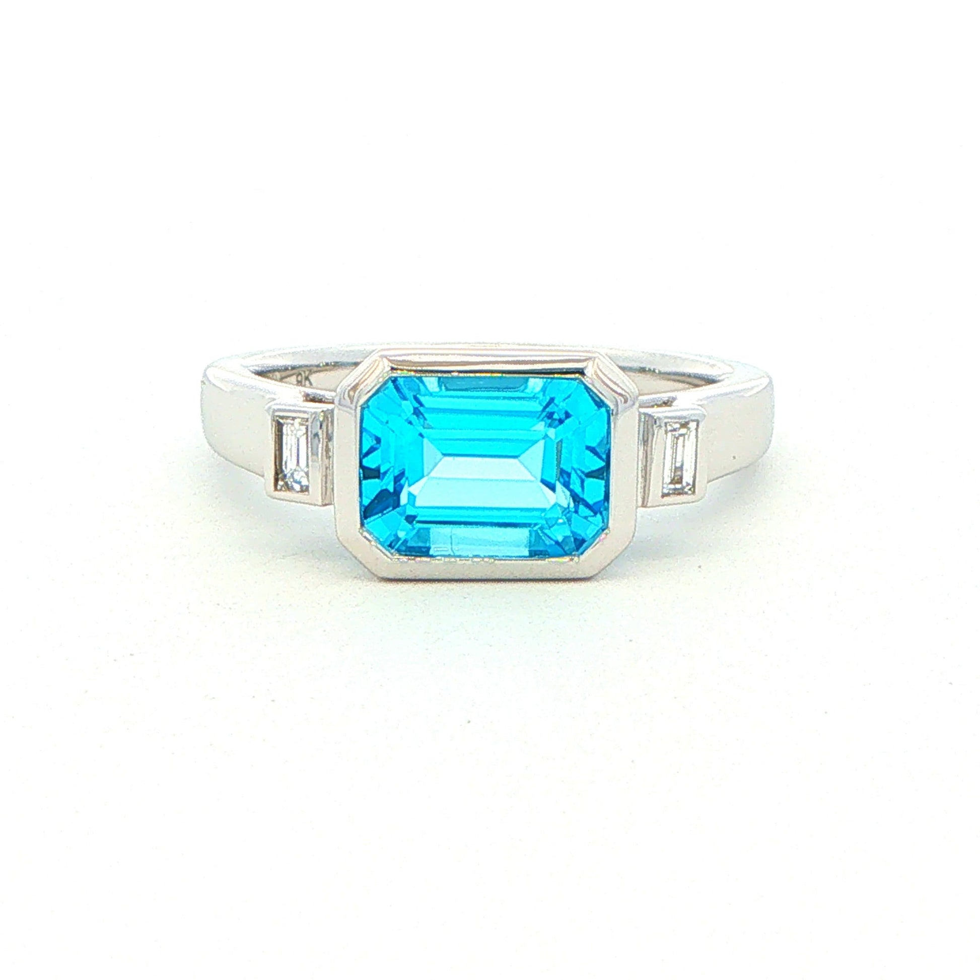 White Gold Topaz and Baguette Diamond Dress Ring Gardiner Brothers