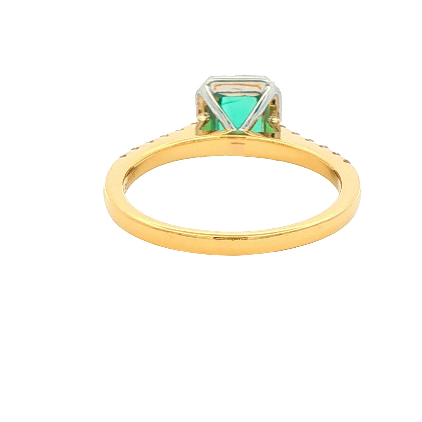 Octagonal Shaped Emerald and Diamond Halo Style Ring