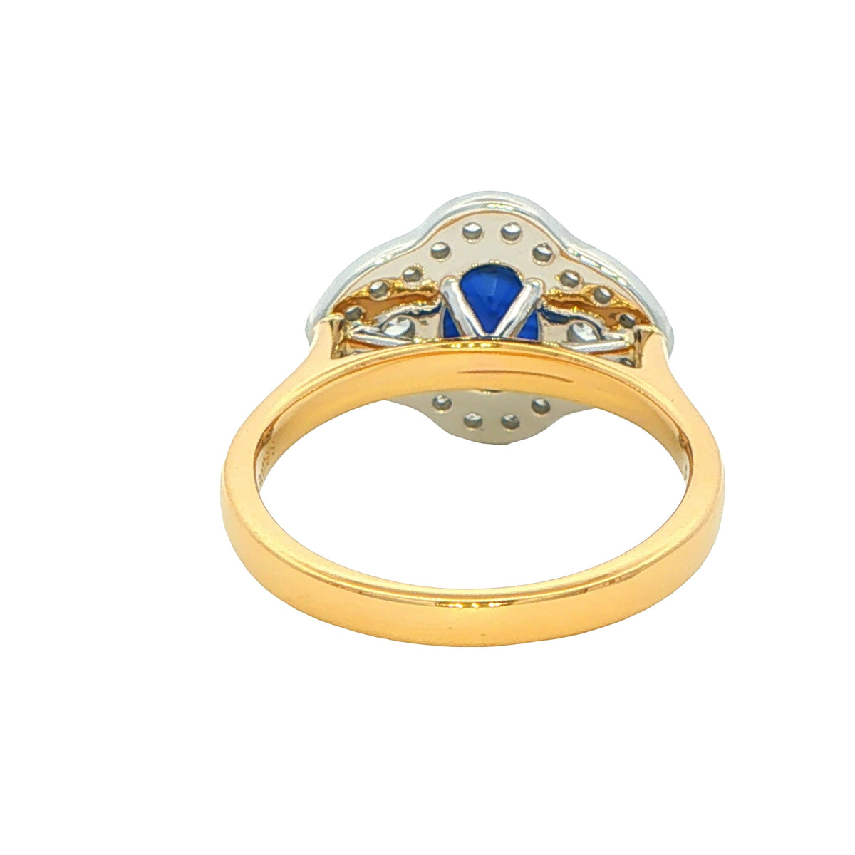 Oval Sapphire and round brilliant cut diamond fancy halo style ring Gardiner Brothers