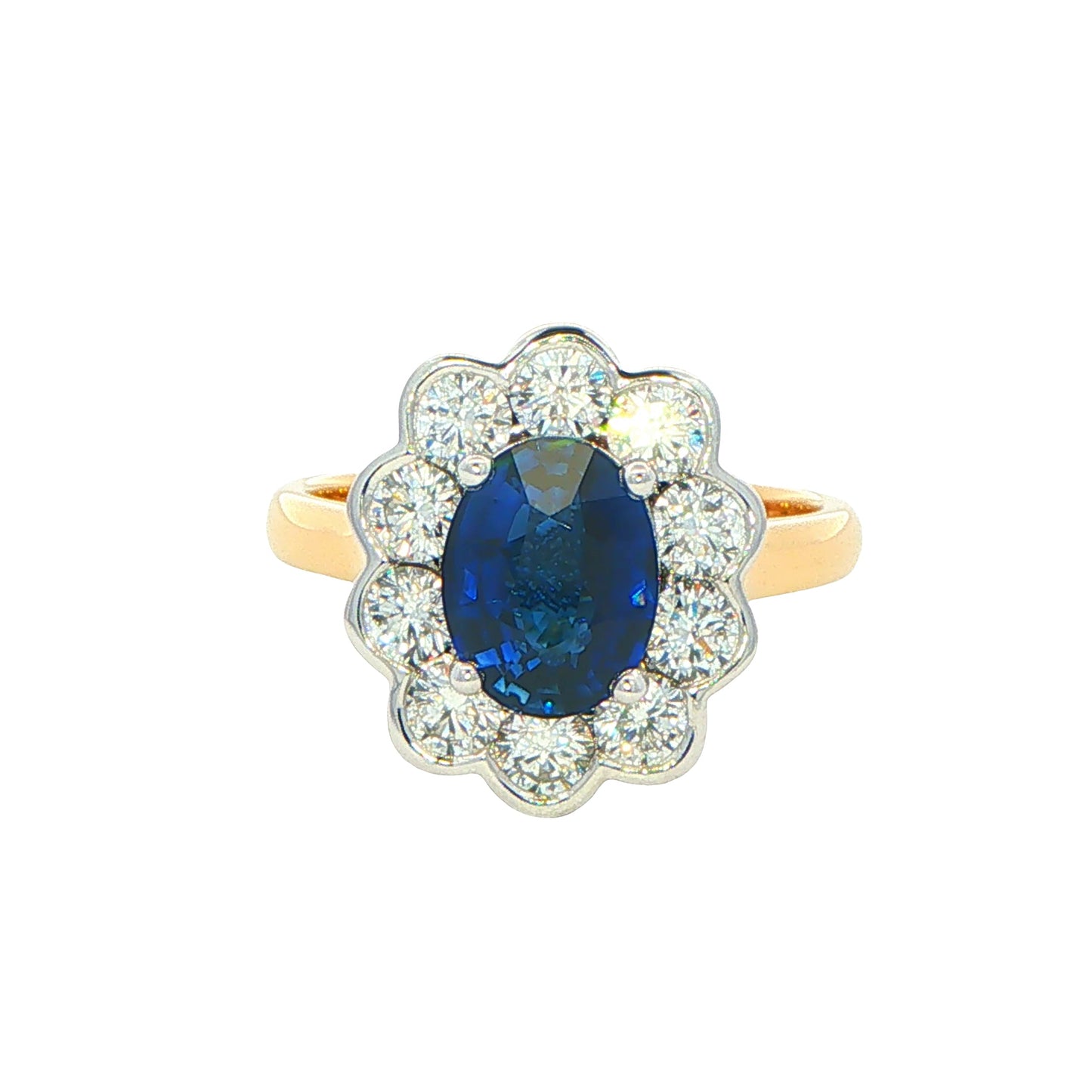 Oval Sapphire and Diamond Modern Cluster Style Ring Gardiner Brothers