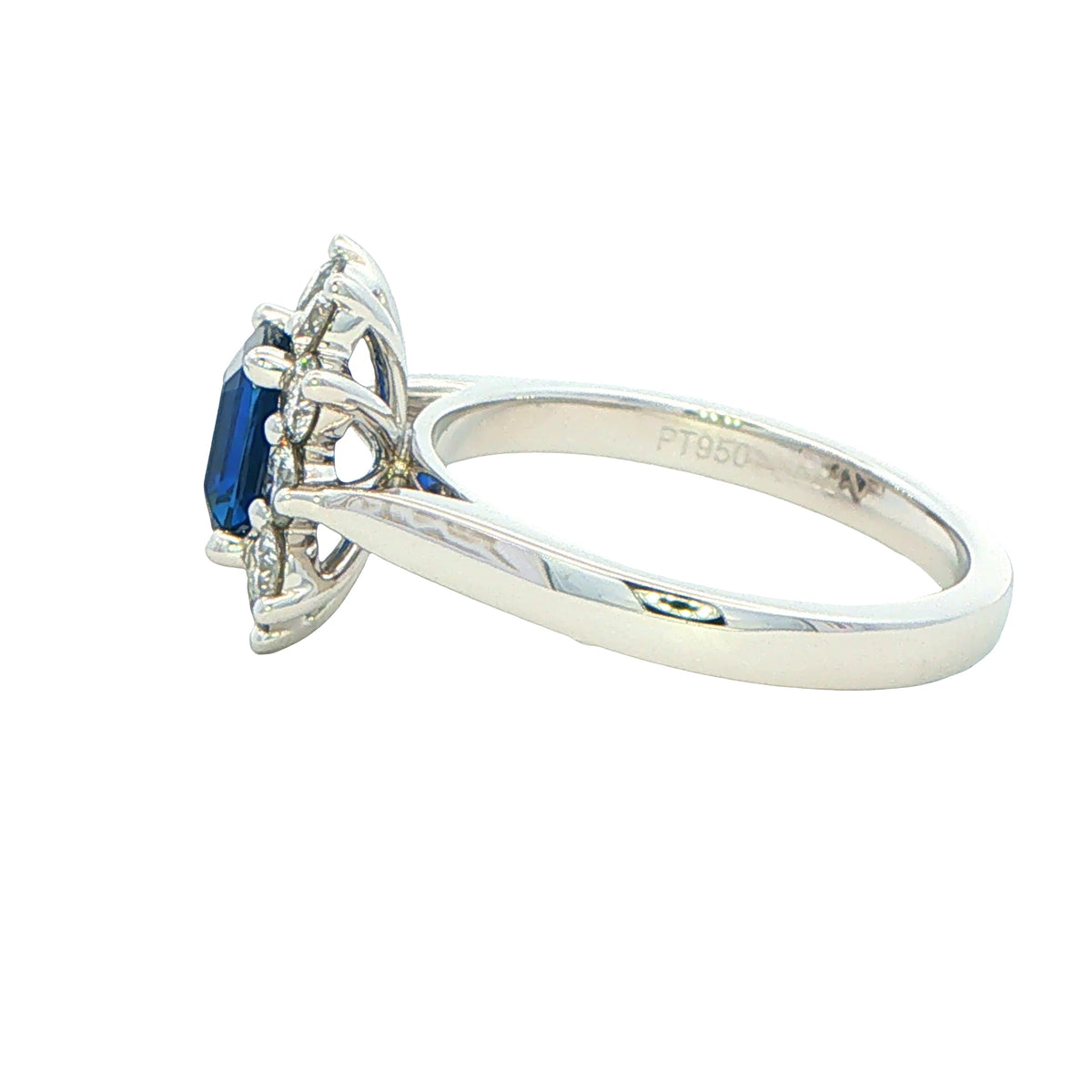 Octagonal Sapphire and round brilliant cut diamond cluster ring Gardiner Brothers
