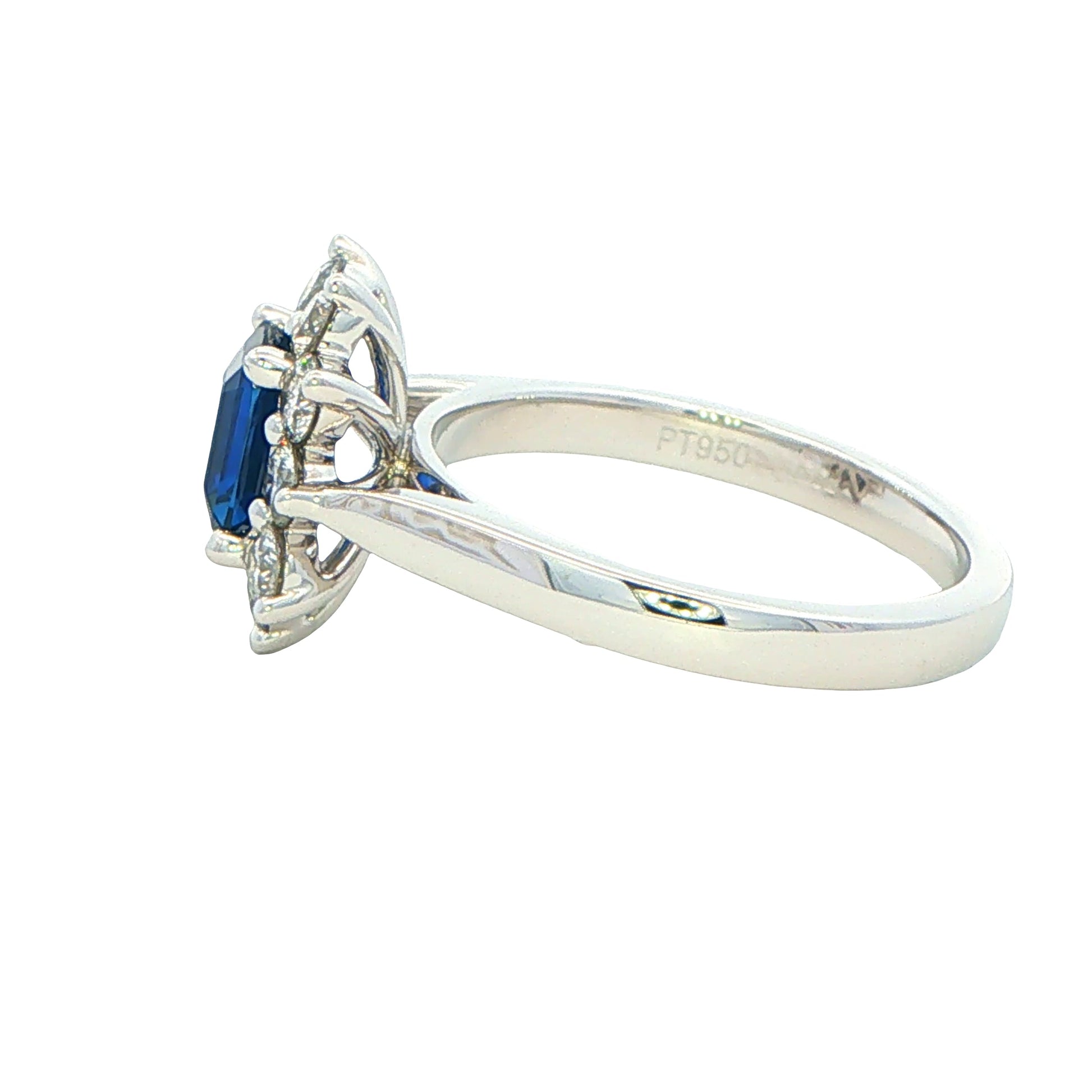 Octagonal Sapphire and round brilliant cut diamond cluster ring Gardiner Brothers