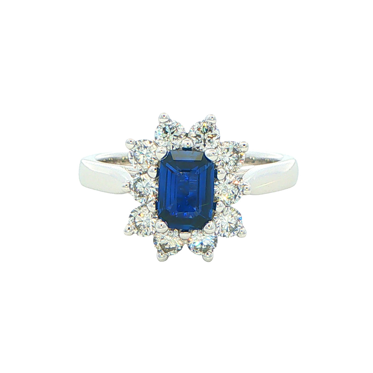 Octagonal Sapphire and round brilliant cut diamond cluster ring Gardiner Brothers