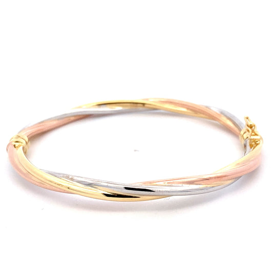 Yellow, Rose and White Gold Twisted Profile Bangle  Gardiner Brothers   