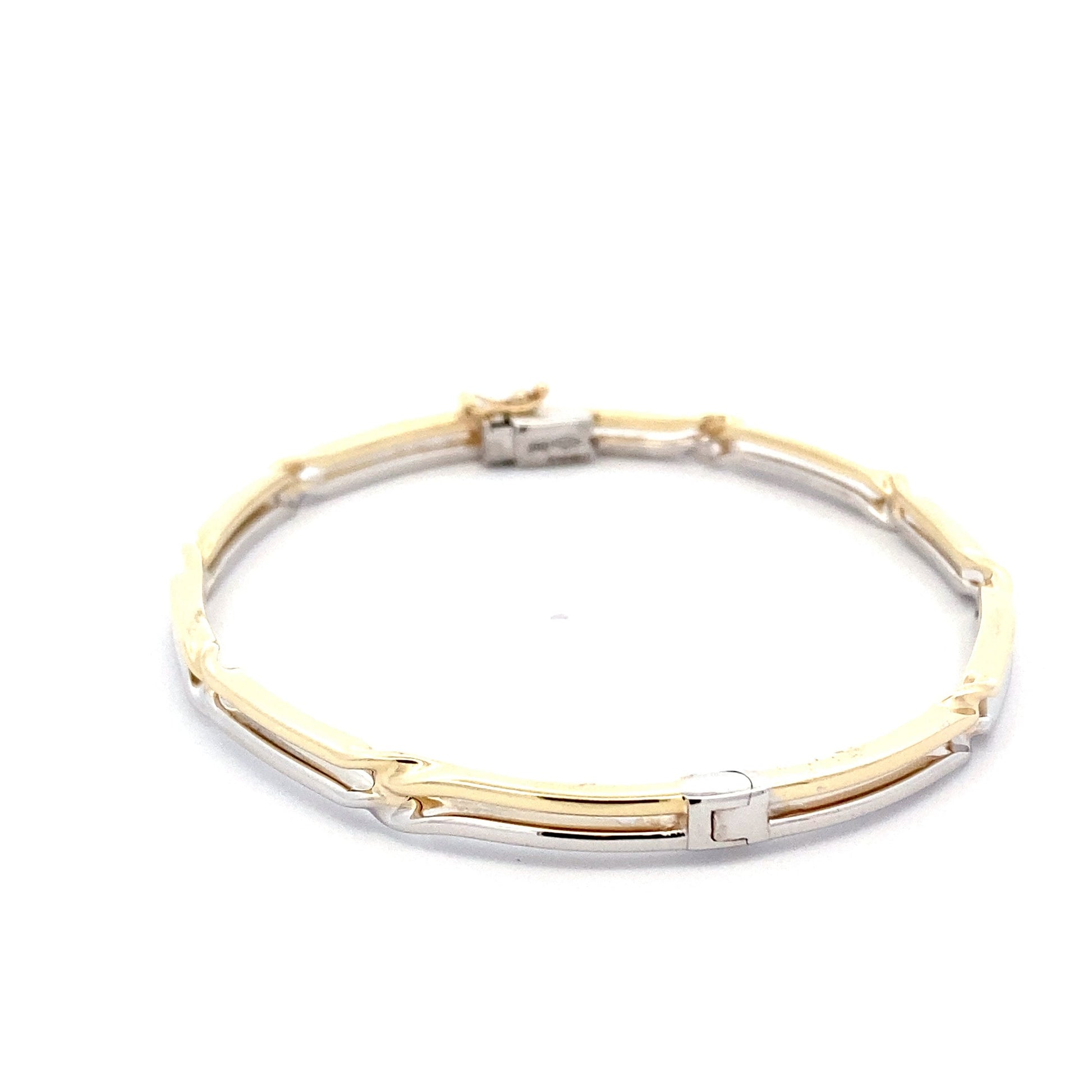 Yellow and White Gold Hinge Bangle with Twists  Gardiner Brothers   