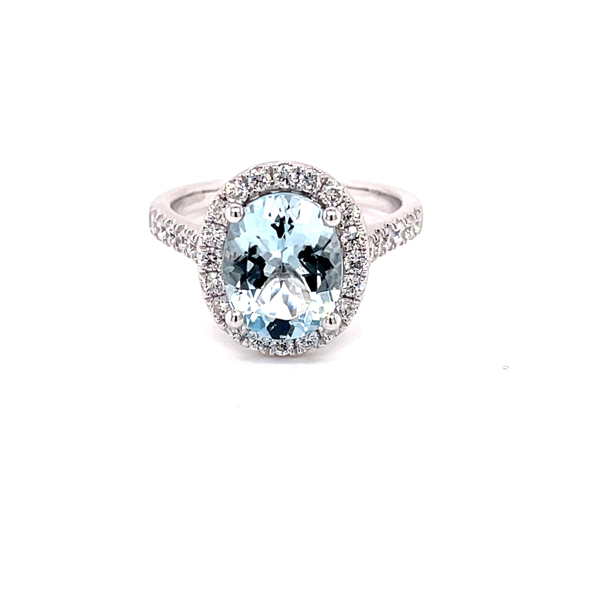 Oval Shaped Aquamarine and Round Brilliant Cut Diamond Halo Style Ring  Gardiner Brothers