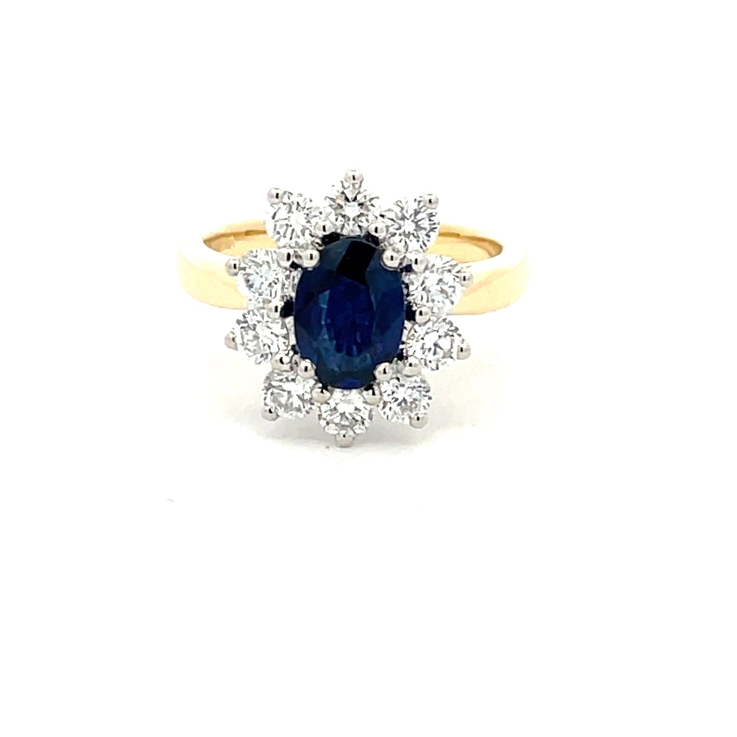 SAPPHIRE AND ROUND BRILLIANT CUT DIAMOND CLUSTER STYLE RING  Gardiner Brothers