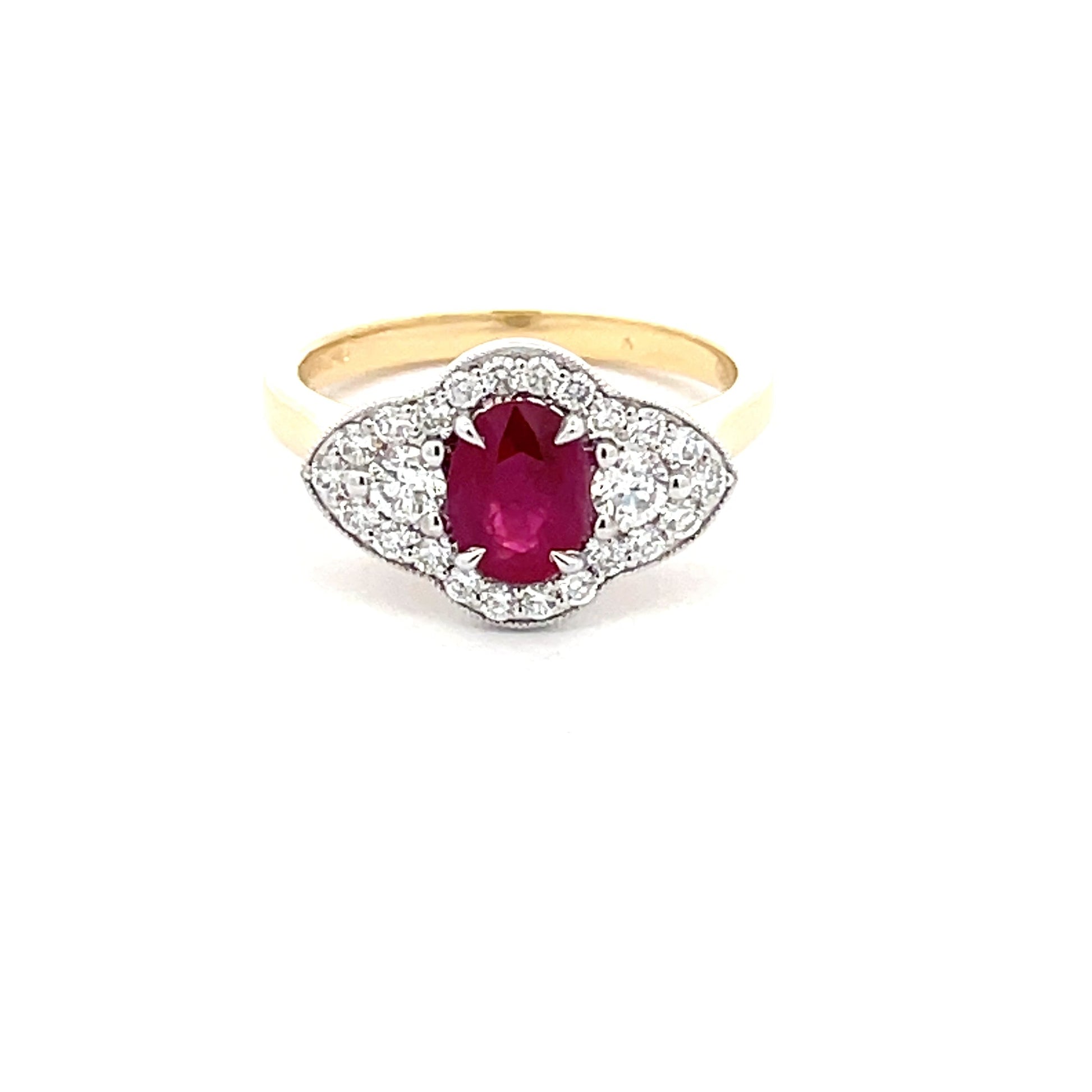 Ruby and diamond vintage halo cluster style ring  Gardiner Brothers