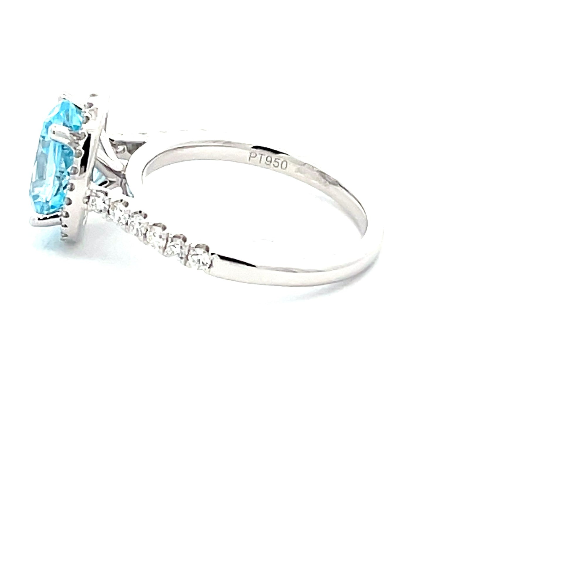 OVAL SHAPED AQUAMARINE AND ROUND BRILLIANT CUT DIAMOND HALO STYLE RING  Gardiner Brothers