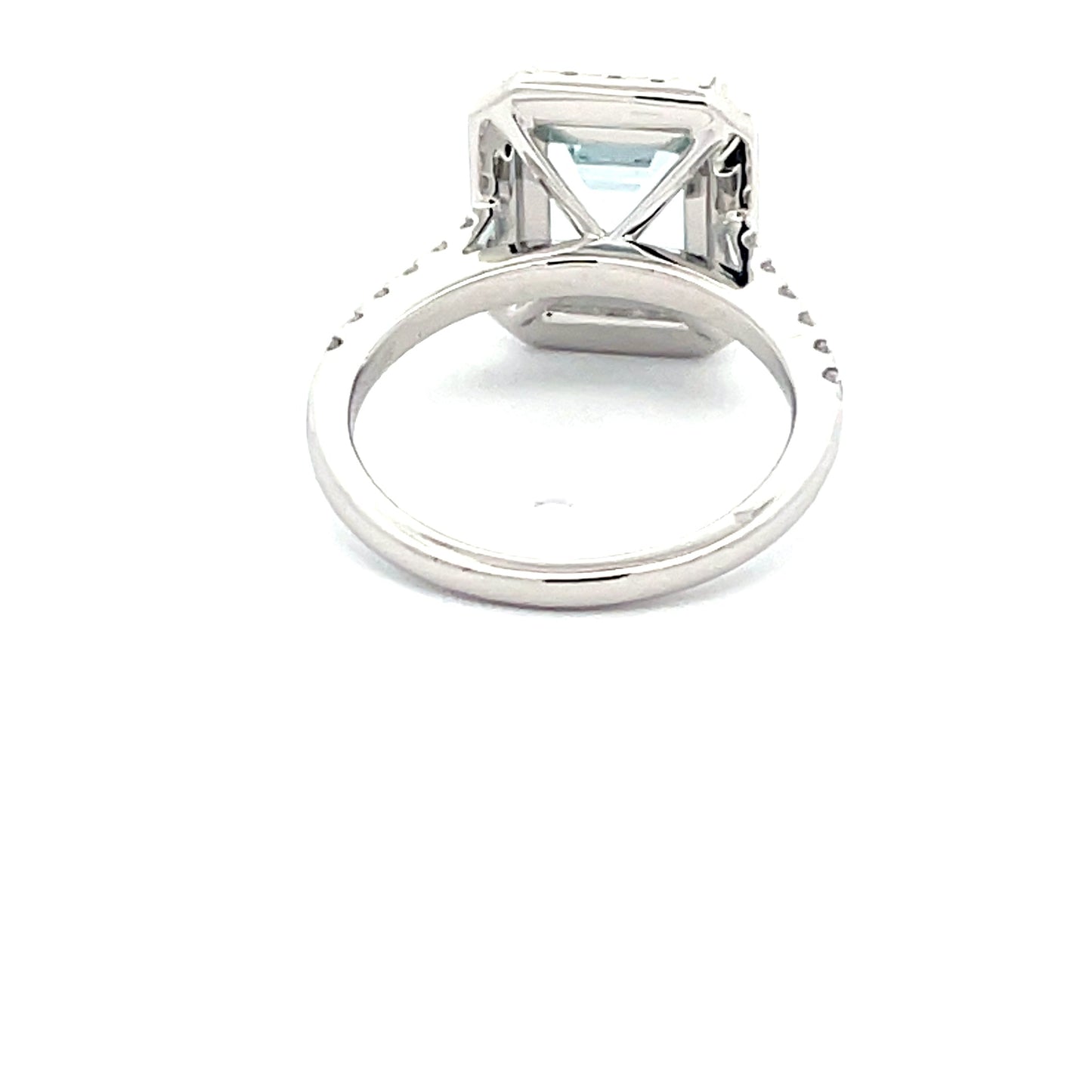 AQUAMARINE AND DIAMOND HALO STYLE RING  Gardiner Brothers