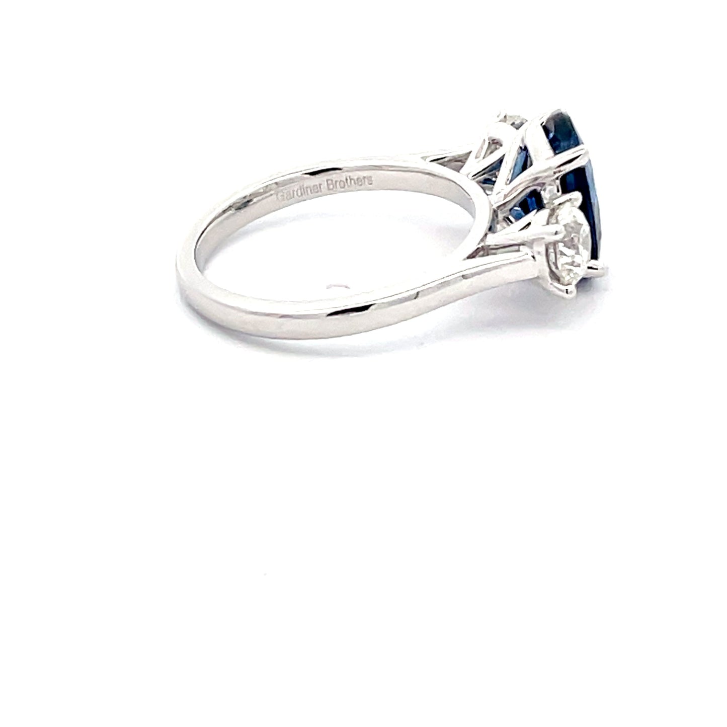 Sapphire and round Brilliant cut diamond 3 stone ring  Gardiner Brothers